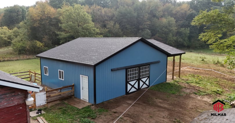 Blue and Shiny Black 30x36x10 Post Frame Pole Barn with Porch and Silvercraft Dutch Doors Aerial Shingle Roof