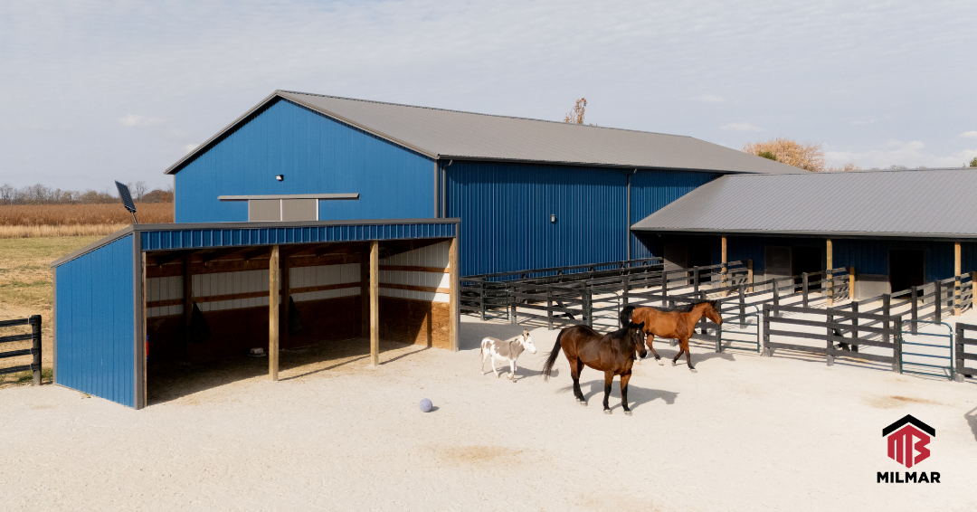 Blue-and-Charcoal-Horse-Barn-Riding-Arena-and-Loafing-Sheds-in-Clinton-Illinois-by-Milmar-Buildings