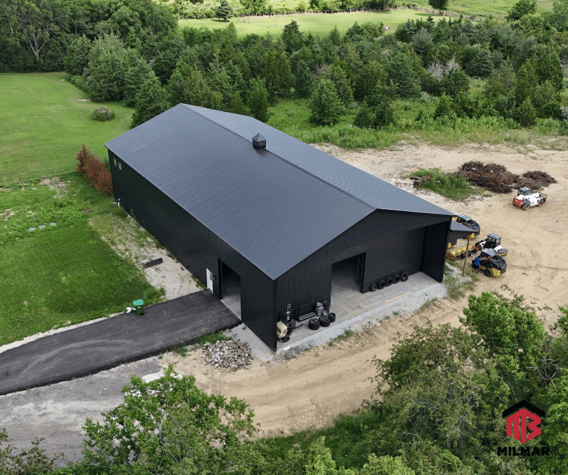 Front Side Aerial View Will County Illinois 60x100x20 Commercial Warehouse Post Frame Pole Barn Garage Storage by Milmar Buildings Shiny Black and Black