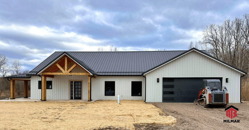 Milmar Post Frame Home Barndominium White Frost and Black Frost Faux Standing Seam Roof Panels Board and Batten-Cottage Panels