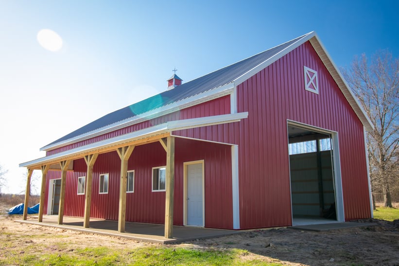 White & Red Pole Barn Front Porch Garage Door
