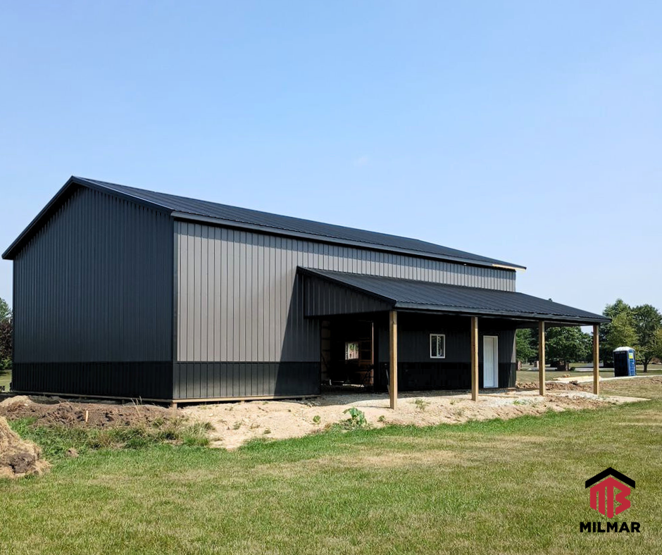36x56x16 In Progress Construction Frankfort IL Post Frame Garage Barn by Milmar Buildings Black and Charcoal
