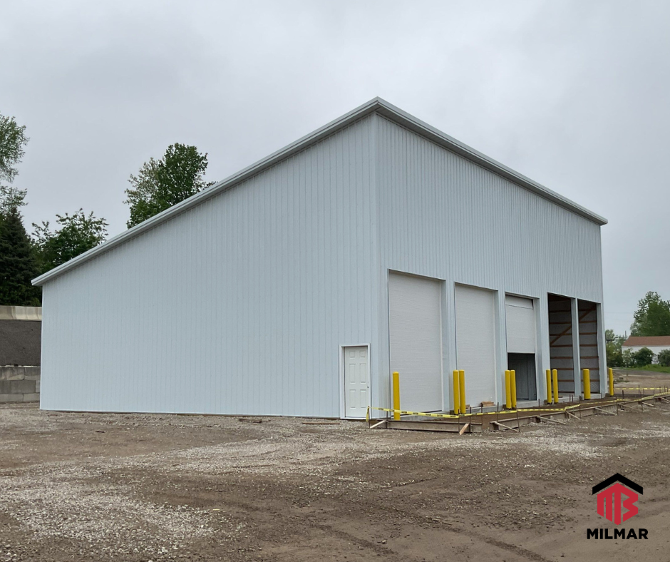 FB 50x72x16 Post Frame Commercial Garage Pole Barn With Garage Doors, Concrete, Mono-slope Roof by Milmar Buildings