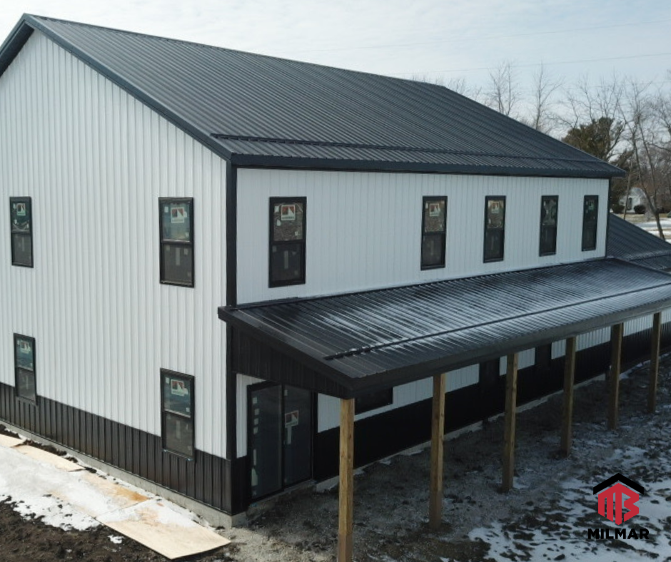 LITwitter Illinois Post Frame Home Barndominium by Milmar Buildings Cottage Panel Board and Batten Shiny Black and Bright White