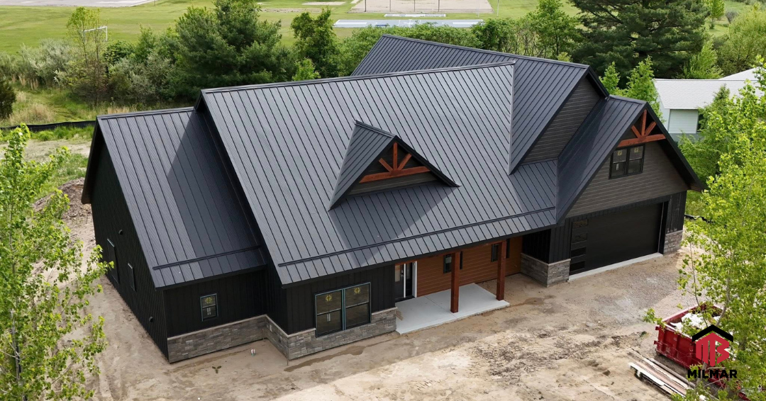 Milmar Homes Barndominium Post Frame Home Black and Charcoal Board and Batten Faux Standing Seam Panels Cedar Accent Metal